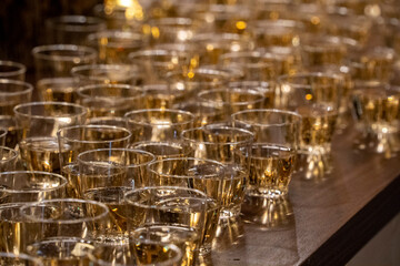 many champagne plastic glasses for celebration party