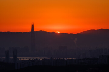 Scenic view of Seoul against sky during sunrise