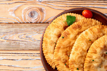 Snack chebureks. Pasties with meat photography . Top view