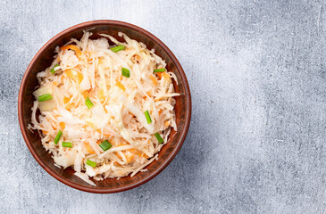 Tasty marinated cabbage with carrot, healthy food  Sauerkraut photography . Top view