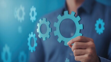 Businessperson Holding Interlocking Gears Teamwork Collaboration and Efficiency Concept