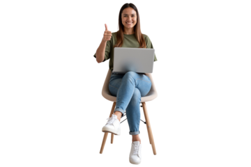 Modern young woman in a green shirt and jeans, using a laptop and giving a thumbs-up