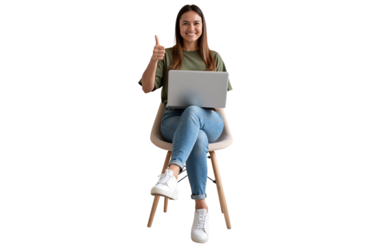 Modern young woman in a green shirt and jeans, using a laptop and giving a thumbs-up