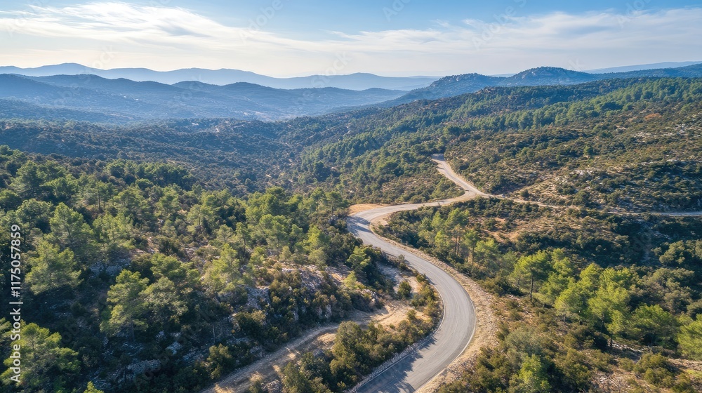Poster aerial view of winding mountain road through lush greenery with picturesque landscape backdrop and a