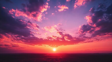 Obraz premium Breathtaking eastern sunset with vibrant colors illuminating the sky and clouds in a serene landscape at dusk