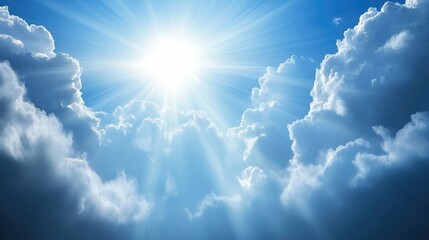 Dramatic Sky with Radiant Sunlight Shining Through Clouds Against Mountainous Backdrop