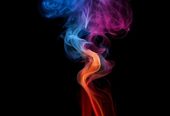 Obraz premium Abstract colorful smoke swirling on a black background.