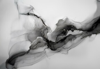 Abstract black ink flowing on white canvas with golden accents.