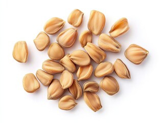 Scattered light brown seeds on white background, food ingredient, healthy eating.