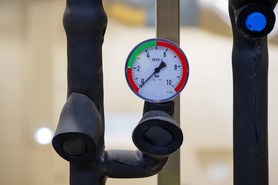 Pressure gauge manometer on industrial installation inside manufacturing plant