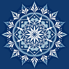 Intricate blue and white mandala design.
