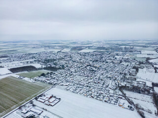 Erwitte Kreis Soest city Airplane view while snowing in deep winter. snow landscape in 59597