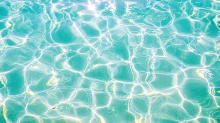 Obraz premium Sparkling turquoise water surface texture.