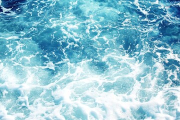 Fototapeta premium A stunning view of crystal clear ocean water with gentle waves, perfect for conveying serenity and natural beauty.