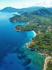 Obraz premium Beautiful coastline view of lush green hills and blue waters
