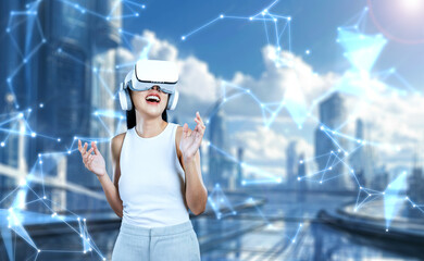 Female stand wear white VR headset and white sleeveless connect metaverse, future technology create cyberspace community. She look around and gesticulate enjoy fantasy building in meta. Hallucination.