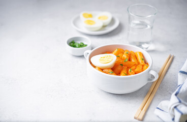 Hot and spicy tteokbokki in sauce in a bowl