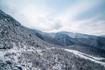 Winter snow capped mountains and ski resorts, Sichuan, China
