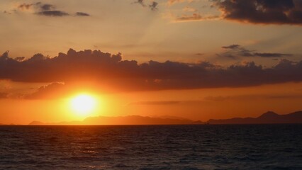 Stunning sunset at the beach in Greece.
