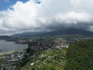 Aerial view of a scenic village near the ocean before the rain
