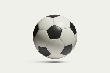 Obraz premium A classic black and white soccer ball, isolated on a white background.