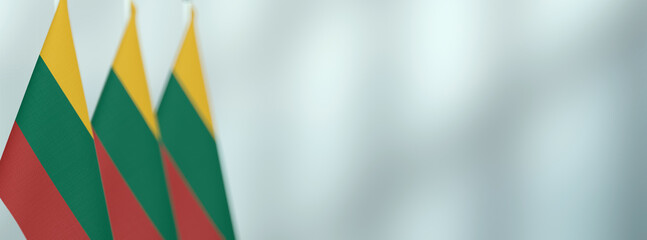 Lithuania table flags in the office, banner background with space for text