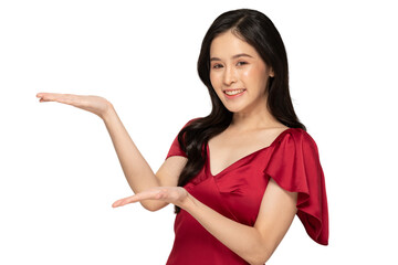 Smiling woman in red dress presenting with open hands on transparency background