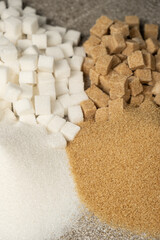 Types of sugar - cane unrefined and white beet refined, crystalline and in the form of cubes.