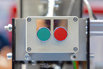 Green and Red Push Buttons On Off Control Box at Industrial Machine