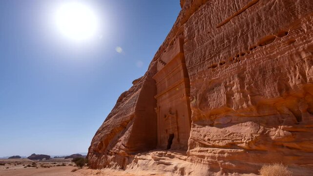 Time lapse of sun and shadow casting the tomb in Archeological site Madain Saleh, Al-`Ula, Hegra,Saudi Arabia.