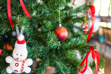 Close up and a Christmas tree decorated in home