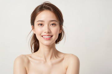 A woman with a beautiful smile and a clean, clear face