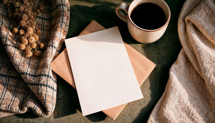 Rustic-inspired setup with blank card, envelope, and autumn decor"