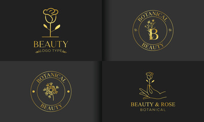 Botanical Floral Element Hand Drawn Golden Logo with Wild Flower and Leaves