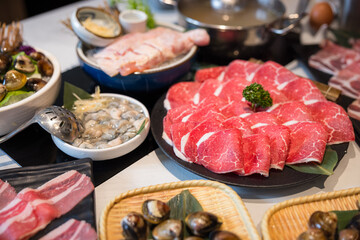 Traditional hotpot meal with fresh ingredients