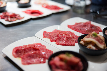 Traditional Japanese yakiniku meal with grilling meat