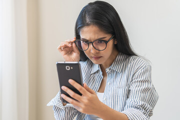 Presbyopia, Hyperopia middle aged asian woman holding eyeglasses problem with vision blurred...