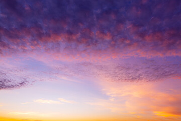 Pink clouds and sky background,Light pink clouds in sunset blue sky. Pastel colors of clouds, sunrise sundown natural background