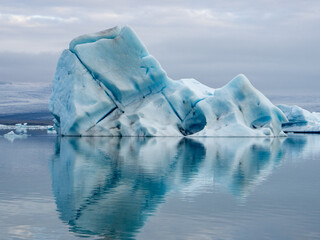 Icebergs in Jokulsarlon lagoon water in iceland near the diamond beach at sunrise