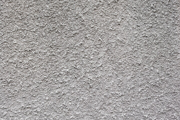 gray plaster wall texture with lots of details .