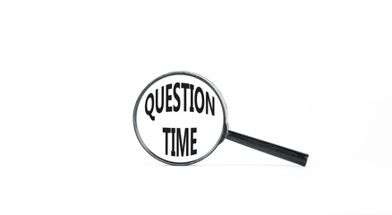 Question time symbol. Concept words Question time on beautiful white paper in magnifying glass. Beautiful white paper background. Business and question time concept. Copy space.