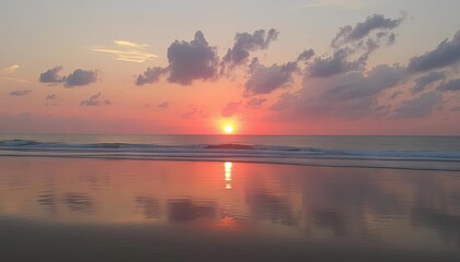 Fototapeta premium Sunrise over calm beach, tranquil scene