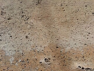 Cracked concrete wall covered with gray cement surface as background, abstract, grunge