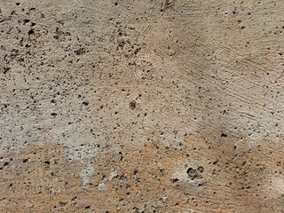 Cracked concrete wall covered with gray cement surface as background, abstract, grunge