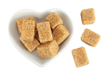 brown sugar in a ceramic bowl isolated on white background. Top view. Flat lay