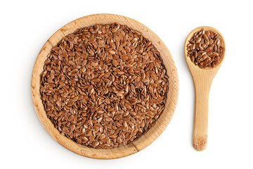 flaxseed in wooden bowl isolated on white background. Top view. Flat lay