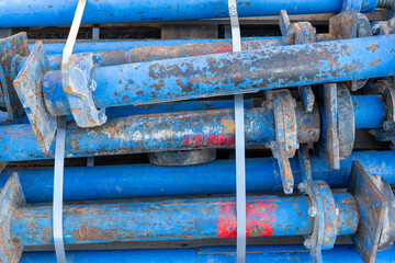 Closeup of blue struts used for shoring and sheeting, after digging out a trench, to prevent the trench to cave in and protect the workers.