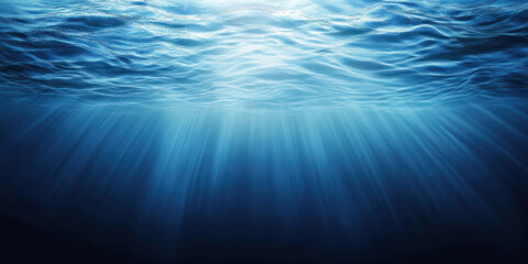 Obraz premium Underwater Photographic Scene: Vast Deep Blue Sea with Sunlight Beams, Natural Lens Flare Effect, Textured Surface Ripples, Depth and Transparency, Marine Photography Inspiration