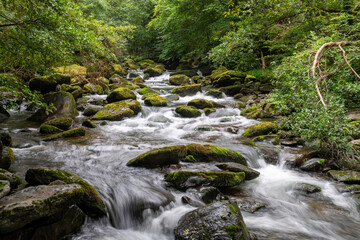 Long exposure of a waterfall on the East Lyn river at Watersmeet in Exmoor National Park