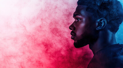 Dynamic profile of American football player with colorful smoke background, showcasing strength and focus